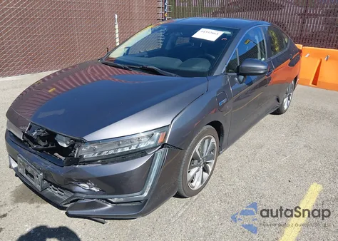 2018 Honda Clarity Plug-In Hybrid z USA, uszkodzony, nr VIN JHMZC5F12JC016825